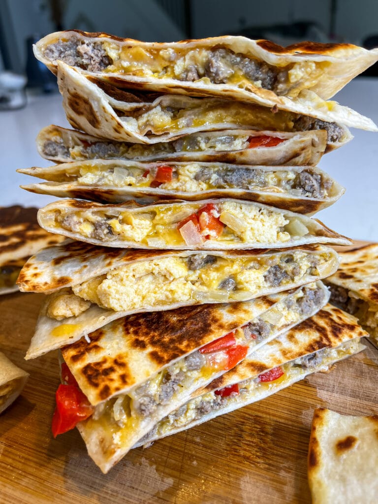 hot honey sausage breakfast quesadillas on cutting board
